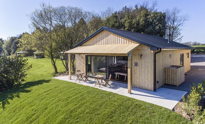 The Pavilion space was meticulously designed and built by us using ethically sourced materials, combining wonderful artisans.